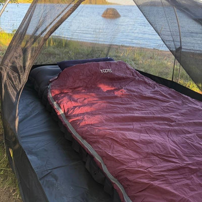 Ultralätt sovsäck - kompakt och varm för backpacking och äventyr